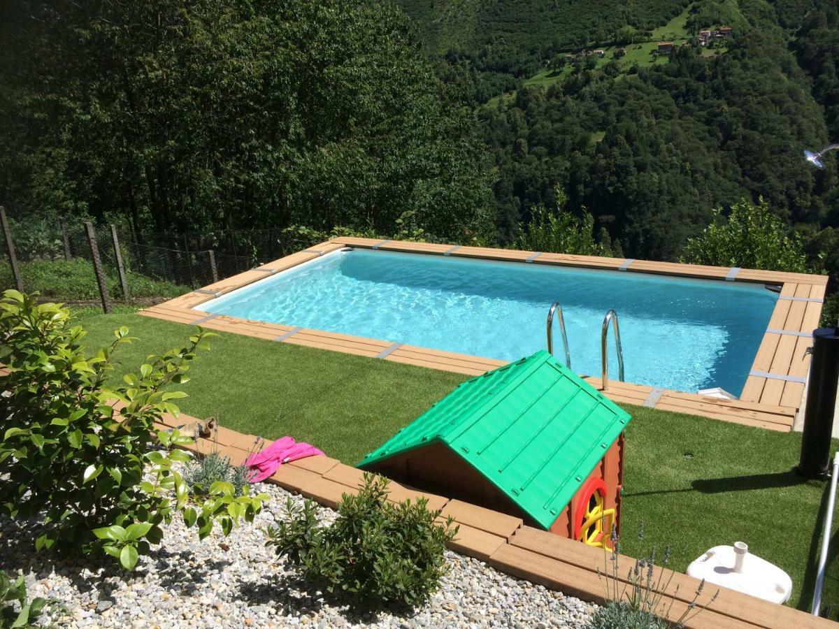 Chalet Con Piscina Garzeno ภายนอก รูปภาพ